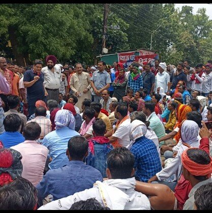 Farmers blocked the road.